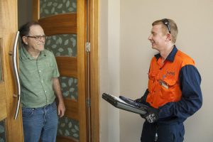 A happy Coomera Waters Solar Customer following a Solar Panel Installation